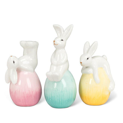 Playful Bunnies with Easter Egg