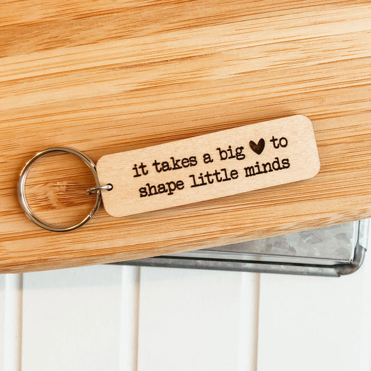 'It Takes A Big Heart To Shape Little Minds' Wooden Keychain
