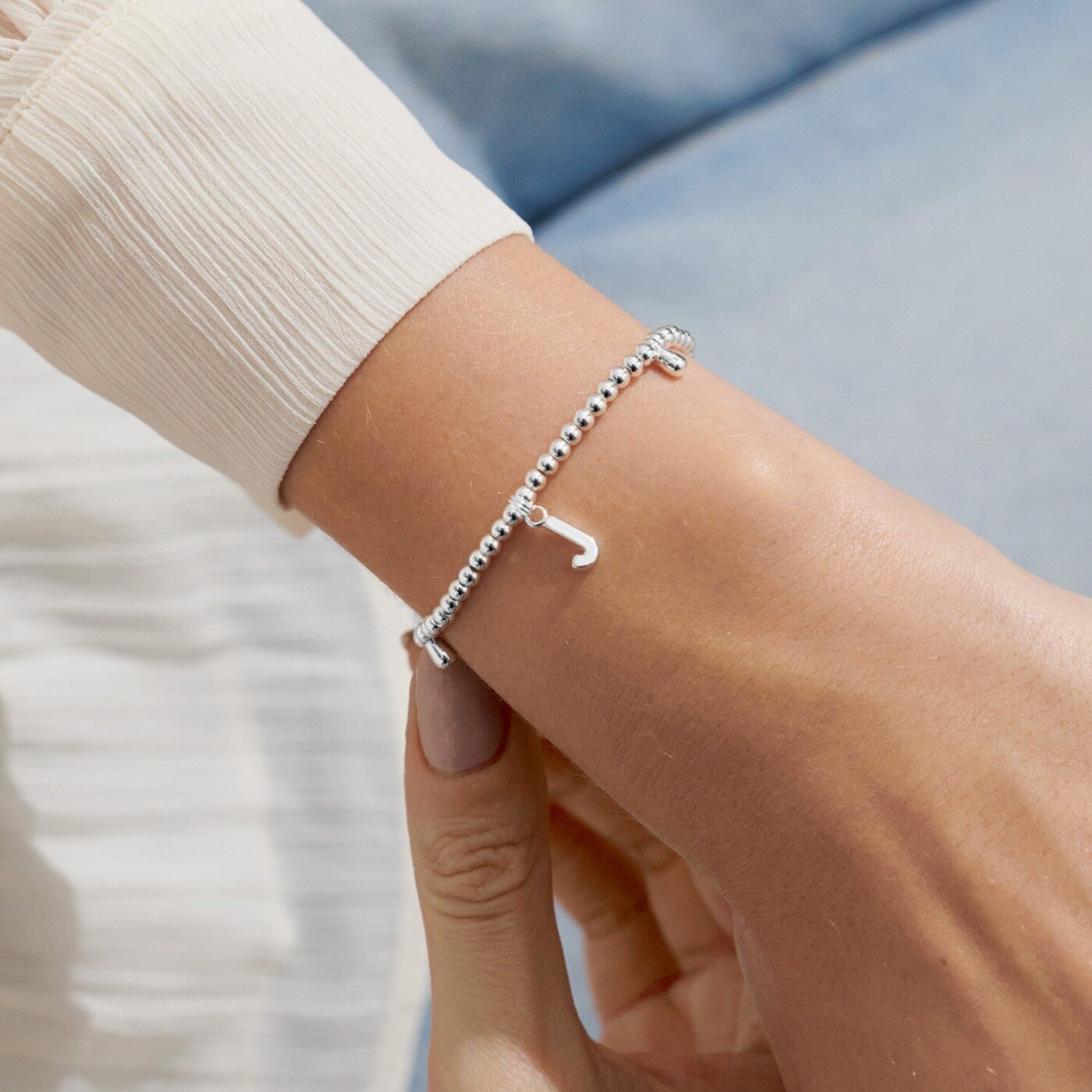 A Little Alphabet Bracelet in Silver Plating